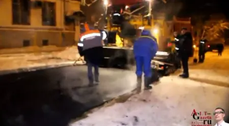 Только в России умеют асфальтировать снег